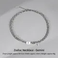 Silver double-layered Gemini zodiac necklace with Roman numeral II and blue gemstone - Gemini