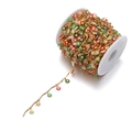 Dettaglio catena con margherite in smalto multicolore su bobina dorata per gioielli fai da te - 15mm / Oro Multicolore