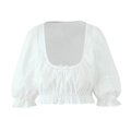 Detailed view of white square neck puff sleeve crop top with a front bow decoration - S / White Top