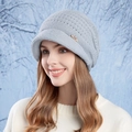 Light blue knit beanie with a small brim and golden crown detail for a cozy winter look - Gray