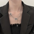 Silver butterfly necklace featuring black heart-shaped gems and asymmetric chains - Butterfly Heart Pendant Necklace (2492) / Silver