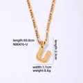 Collana in acciaio inossidabile dorato con pendente lettera U e catena Figaro - Lettera U / Oro