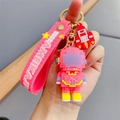Rosa Pixel-Astronaut Schlüsselanhänger mit Silikonarmband und rotem Raketen-Anhänger - Pixel Astronaut--Rosa