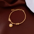 Detail of 18k gold plated bracelet with cat eye stone, bow charm and shell pendant - Gold - Shell Bow Pendant