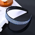 Sparkling blue rhinestone headband for women with black base on photography props - Grid Blue AB Full Rhinestone