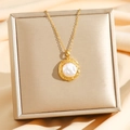 Golden baroque pearl clover necklace on champagne silk gift box background - Gold Oval Style (8789)