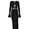 Detailed view of rhinestone flower decor on black V-neck dress with flare sleeves - S / Black
