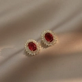 Gold earrings with oval red gemstone and white zircon double halo on champagne silk - Oval Red Diamond Style (E0234)