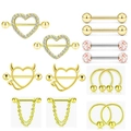 Nipple ring set featuring gold heart shapes and stainless steel barbell piercings - Gold