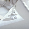 Elegant cherry pendant necklace with twin white pearls and zircon-encrusted silver leaves - Silver