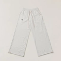 Dettaglio della vita regolabile con coulisse sui pantaloni sportivi ampi crema - XS / Bianco Antico