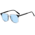 Modern square sunglasses with transparent black frames and light blue lenses in a 45-degree view - Transparent Black Frame Blue Lens