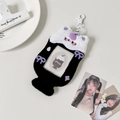 Detail of plush black and white cat photo card holder with purple bow and star embroidery - Black