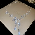 Close-up of silver-toned leaf and teardrop necklace with sparkling clear zircon stones - Silver Butterfly Necklace (160#)