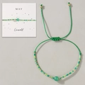 Handgefertigtes smaragdgrünes Perlenarmband mit verstellbarer Kordel für den Mai - Mai Geschenkbox/Grün/Smaragd