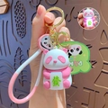 Pink and white glowing panda keychain with Mahjong tile and green PANDA strap - Fortune Light Panda - Pink