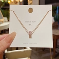 Collana in acciaio al titanio oro rosa con pendente a cilindro e zirconi scintillanti - Stile Cilindro con Zirconia (X370) / Oro rosa