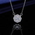 Silver flower cluster necklace with snowflake pendant and centered gem on dark backdrop - Xl-109