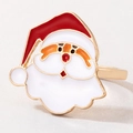 Vista macro del anillo de Papá Noel con detalles de esmalte rojo y blanco - Santa Claus