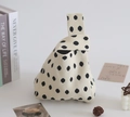 Polka dot knitted gift bag in cream white with a unique single handle design - Black Polka Dots