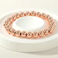 Minimalist 18K rose gold plated bead elastic bracelet with polished smooth finish - 8mm / Rose Gold