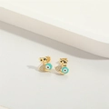 Detail of gold teddy bear earrings with turquoise evil eye and zircon stones - Lake Blue Bear