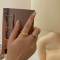 Minimalistische geometrische Wellenringe im Set aus poliertem Gold und Silber - Silber / Einstellbar Offen