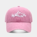 Close-up of pink washed cotton baseball cap featuring white mountain and forest embroidery - Adjustable / Pink
