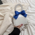 Mini white leather handbag with blue bow detail and silver chain strap for women - White