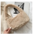 Close-up of soft beige faux fur texture on this stylish plush underarm handbag - Khaki