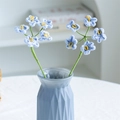 Handcrafted light blue crochet forget-me-not flower bouquet in a blue glass vase - 5-Head Forget-Me-Not Blue