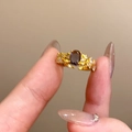 Macro detail of vintage gold floral ring with oval purple gemstone and accent diamonds - Purple Oval Main Stone Style - Gold (23#)