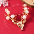 Detail showing a golden reindeer brooch with white pearls and 4.4cm size dimensions - Pearl Antlers (WBR244)