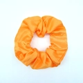 Elegant bright orange satin scrunchie made of glossy silk-like fabric with elastic band - Bright Orange