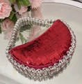 Macro detail of red sequin evening bag with sparkling rhinestone beaded handle - Red Sequin