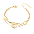 Double-layered 18k gold plated butterfly bracelet with shell inlay and sleek geometric chains - Bracelet / Gold