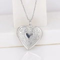 Silver heart locket necklace with floral relief and polished finish on white marble - Convex Wreath Heart 29*29/Steel