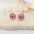 Vintage evil eye stud earrings with pink glitter resin in silver settings on a stone - Silver Pink Glitter Eye