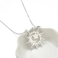 Silver sun and moon pendant necklace on a shell dish, long minimalist chain for women - Steel