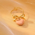 Golden stainless steel bow ring with pink heart pendant and size dimensions - One Size / Flesh Pink