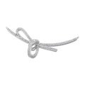 Macro shot of silver bow pendant with sparkling pave set zircons for jewelry making - VD1493 Style / White Gold