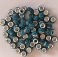 Close-up of sparkling blue rhinestone large hole beads with silver metal inner cores - Peacock Blue