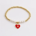 Elegant gold beaded bracelet with white pearls and a red enamel heart lock pendant - Pearl with Red Heart Lock