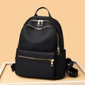 Minimalist black waterproof oxford backpack with gold zippers and spacious compartments - Small / Black