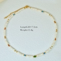 Detail of beaded gemstone necklace showing length 40+7.5cm and weight 11.8g measurements - Cream Disc Blue Red Accent (1143)