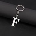 Polished stainless steel keychain featuring a vintage silver-finish letter F pendant - Letter F