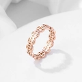 Detail shot of a rose gold Chinese coin lucky charm ring with polished finish - Size 5 / Rose Gold