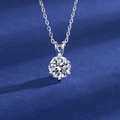 Silver plated necklace featuring a round cut moissanite pendant on blue background - One-carat White Gold Rabbit Necklace Xl-75