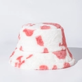 Detail of soft pink cow print plush bucket hat with fuzzy faux fur texture and warm fabric - M (56-58cm) / Pink