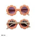 Kids flower-shaped sunglasses with orange-pink frames and beige temples for UV protection - Kids / C35 Orange Frame Beige Temple